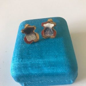 Gold women’s earring